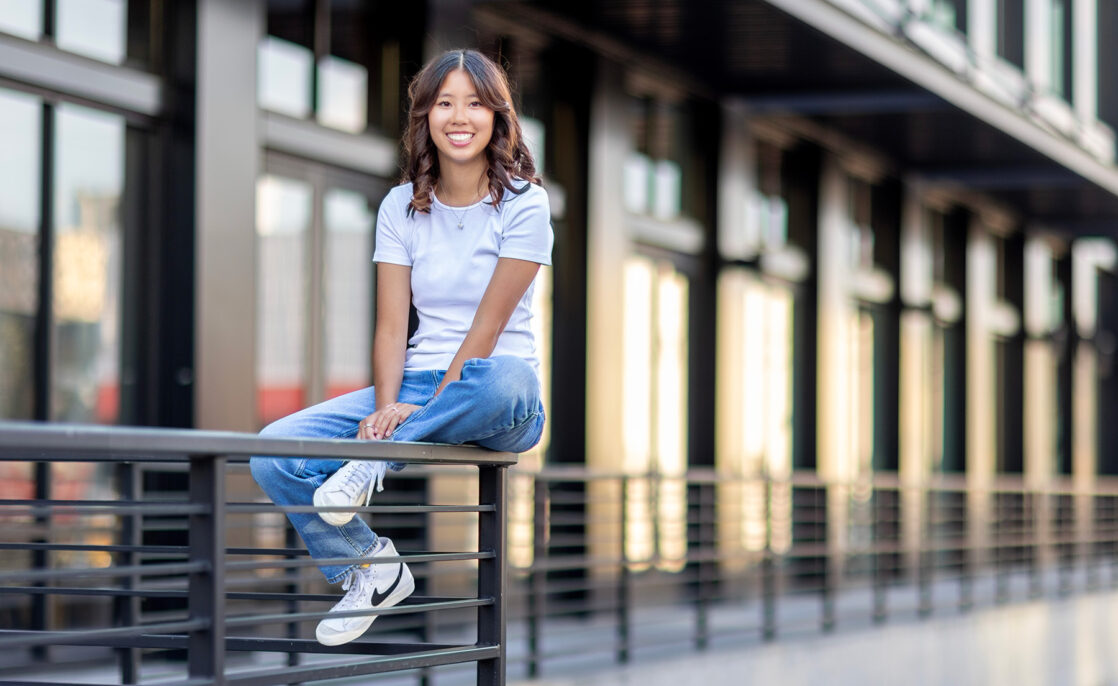 Sitting on railing